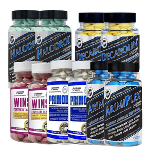 Collection of supplement bottles with various labels on a white background