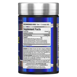A bottle of Peak02 Organic Mushrooms supplement with a dark blue label and a metallic silver cap, shown against a plain white background.