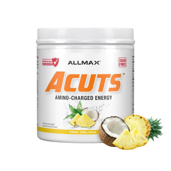 A white plastic tub of ALLMAX Acuts Amino-Charged Energy supplement in Pina Colada flavor, featuring pineapple and coconut graphics on the label, with a few loose pineapple slices and a coconut placed in front of the tub on a white background.