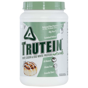 Trutein protein powder container with green lid on a white background