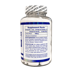 A white supplement bottle with a blue and white label showing the Supplement Facts panel for Creatine Nitrate 1600mg. The bottle is sealed with a white protective cap featuring black warning text, set against a plain white background.