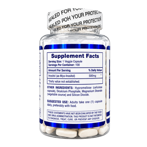 A clear plastic supplement bottle with a white cap, showing a blue and white 'Supplement Facts' label. White capsules are visible inside the bottle, and the cap has a seal tape.