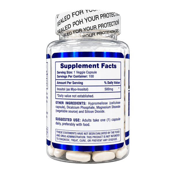 A clear plastic supplement bottle with a white cap, showing a blue and white 'Supplement Facts' label. White capsules are visible inside the bottle, and the cap has a seal tape.