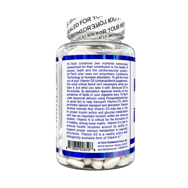 A bottle of Hi-Hi Pharmaceuticals Vitamin K2 and D3 supplement shown from the back, featuring a white label with blue borders and text, a white cap with a printed seal, and a barcode at the bottom.