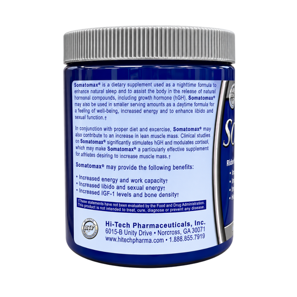 A blue bottle of Hi-Tech Pharmaceuticals Somatamax dietary supplement with a gray ribbed cap, shown from the back against a white background.