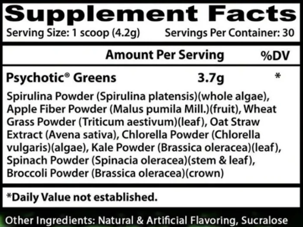 A close-up of a supplement facts label for Psychotic Greens, showing serving size, daily value information, and a list of ingredients including spirulina powder, apple fiber powder, wheat grass powder, oat straw extract, chlorella powder, kale powder, spinach powder, and broccoli powder.