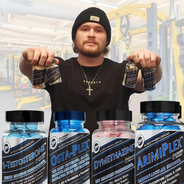 Man holding supplement bottles in a warehouse setting