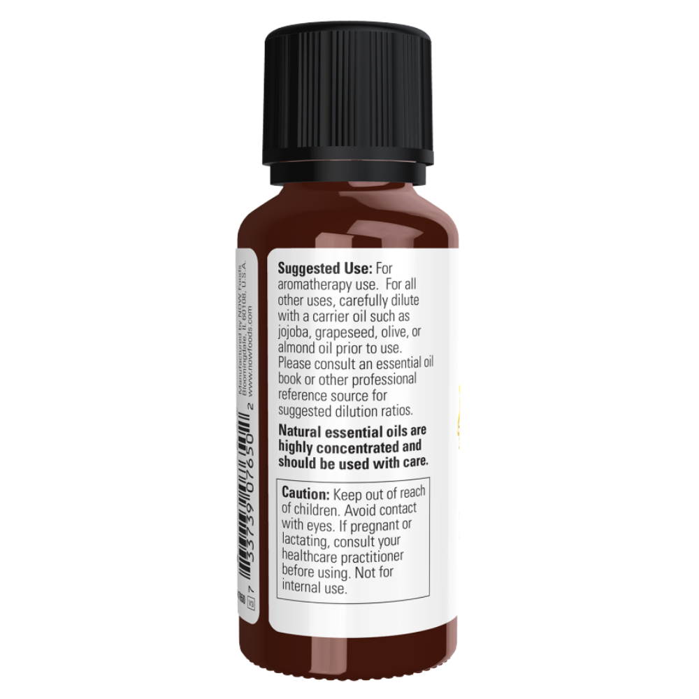 A 1 fl. oz. now foods essential oil bottle 100% pure ylang ylang extra