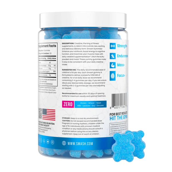A bottle of Smash Creatine Zero dietary supplement shown from the back, featuring a white cap, blue label with white text, and several blue gummy candies in the foreground on a white background.