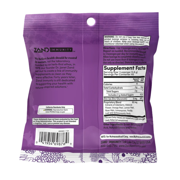 The back of a purple Zand Immunity herbal supplement pouch, showing the full ingredients list, warning label, and supplement facts on a white background.