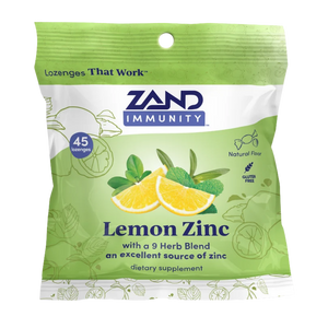 Zand Immunity Lemon Zinc lozenge packet, featuring a light green and white design with illustrations of lemons, limes, and mint leaves, containing 45 lozenges.