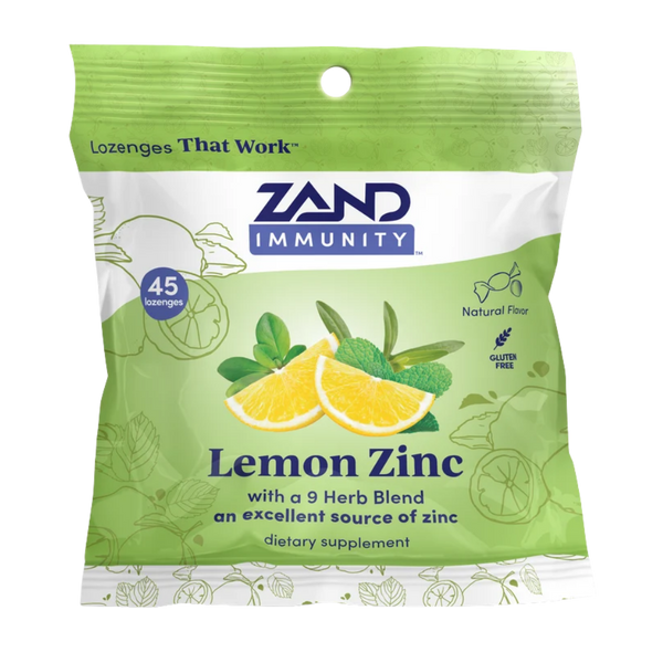 Zand Immunity Lemon Zinc lozenge packet, featuring a light green and white design with illustrations of lemons, limes, and mint leaves, containing 45 lozenges.