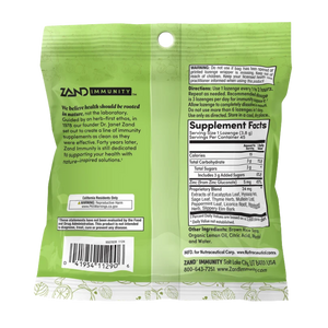 The back of a green Zand Immunity herbal supplement pouch, showing the brand name, product description, directions, and a Supplement Facts label on a white background.