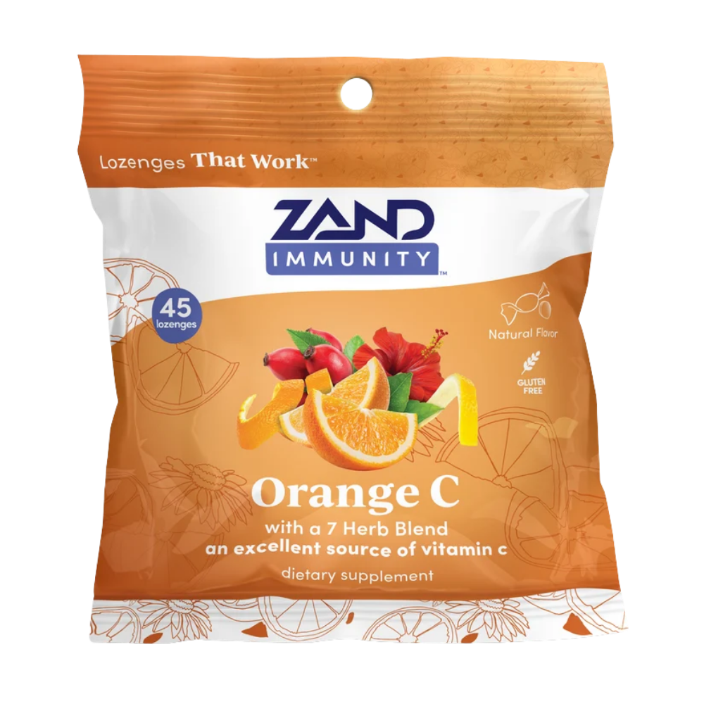 Zand Immunity Orange C dietary supplement pouch, featuring a bright orange and white bag with illustrations of oranges, red hibiscus flowers, and a lemon slice. The packaging includes the Zand Immunity brand logo and highlights 45 lozenges.