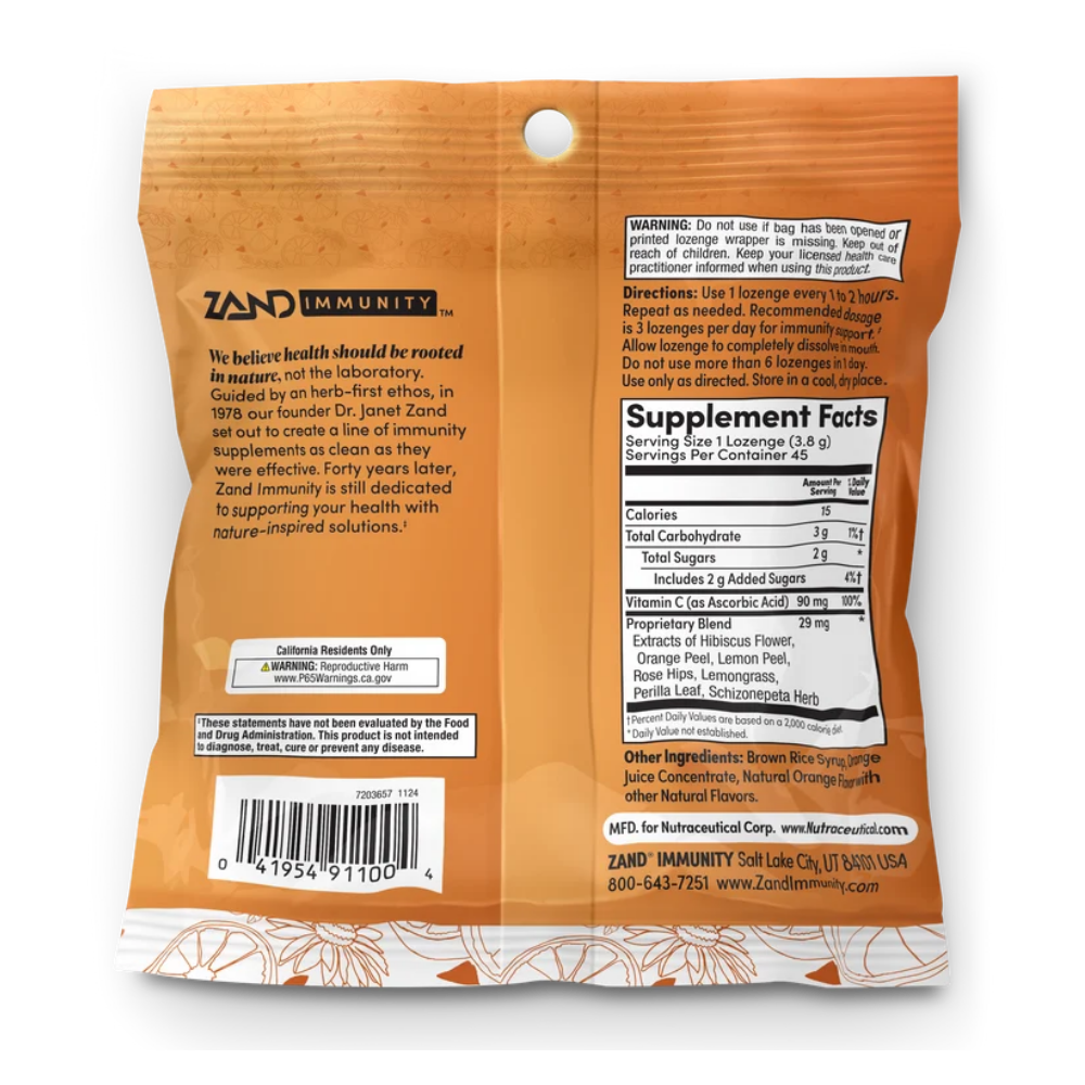 Zand Immunity Orange C dietary supplement pouch, featuring a bright orange and white bag with illustrations of oranges, red hibiscus flowers, and a lemon slice. The packaging includes the Zand Immunity brand logo and highlights 45 lozenges.
