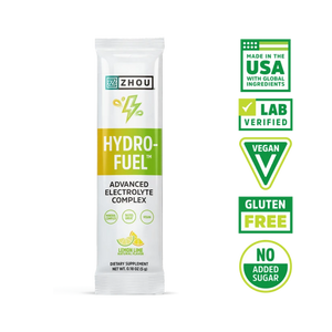 A single stick pack of ZHOU Hydro-Fuel Advanced Electrolyte Complex on a white background, with five green and white certification badges displayed to the right.