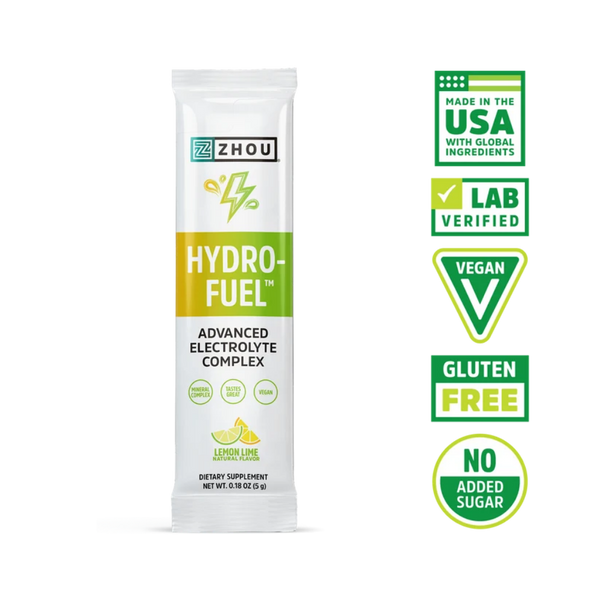 A single stick pack of ZHOU Hydro-Fuel Advanced Electrolyte Complex on a white background, with five green and white certification badges displayed to the right.