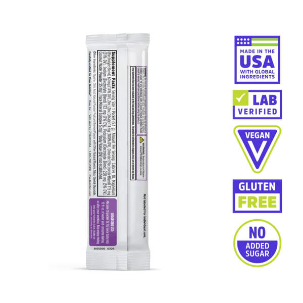 A single stick pack of Nutri-Grain Multigrain Cereal shown from the back on a white background, with five feature badges on the right: Made in the USA with Global Ingredients, Lab Verified, Vegan, Gluten Free, and No Added Sugar.